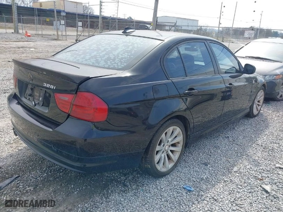 2011 BMW 3 Series 328i with VIN WBAPH7C56BE852007, listed as a IAAI auction lot 41764362 with 135,616 mi miles. Bid and sale history available at carsss.com. Image 4.