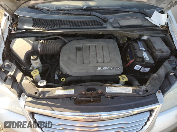 2012 Chrysler Town & Country Touring z VIN 2C4RC1BG2CR127373, wystawiony jako Copart lot #77104484 z przebiegiem 138 263 mil mil oraz Szkoda całkowita • Salvage title. Historia ofert i sprzedaży dostępna na DreamBid. Obrazek 13.