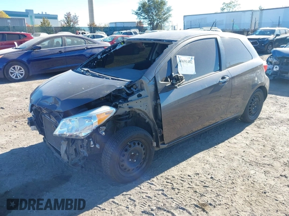 2013 Toyota Yaris L with VIN JTDJTUD33DD550976, listed as a IAAI auction lot 40691482 with 149,614 mi miles. Bid and sale history available at carsss.com. Image 2.