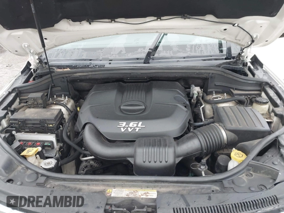 2012 Jeep Grand Cherokee Laredo with VIN 1C4RJFAG6CC297958, listed as a IAAI auction lot 40859811 with 213,499 mi miles. Bid and sale history available at carsss.com. Image 10.