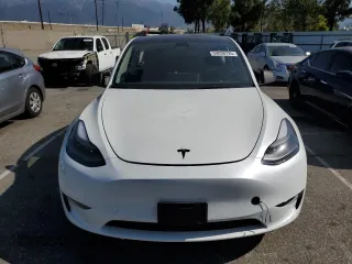 2024 Tesla Model Y с VIN 7SAYGDED6RF109727, выставлен на аукционе Copart как лот 59038725 с пробегом 14 948 миль миль и Списание • Salvage title. История ставок и продаж доступна на DreamBid. Изображение 5.