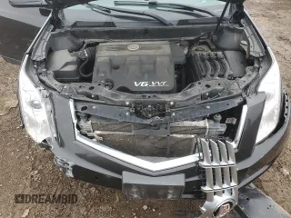 2014 Cadillac SRX Luxury Collection z VIN 3GYFNEE34ES685593, wystawiony jako Copart lot #52202805 z przebiegiem 139 869 mil mil oraz Szkoda całkowita • Salvage title. Historia ofert i sprzedaży dostępna na DreamBid. Obrazek 12.