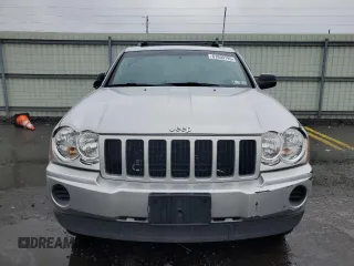 2005 Jeep Grand Cherokee Laredo with VIN 1J4GR48K55C719634, listed as a Copart auction lot 61809195 with 141,316 mi miles and Salvage title. Bid and sale history available at DreamBid. Image 5.