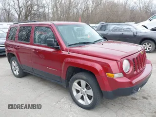 2014 Jeep Patriot Latitude with VIN 1C4NJRFB6ED540761, listed as a IAAI auction lot 41902225 with 216,442 mi miles. Bid and sale history available at carsss.com. Image 1.