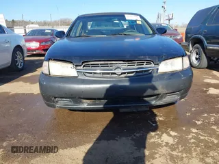 1999 Nissan Altima XE with VIN 1N4DL01D2XC156582, listed as a IAAI auction lot 41783168 with 292,251 mi miles. Bid and sale history available at carsss.com. Image 12.