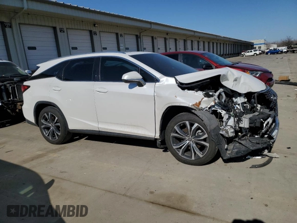 2020 Lexus RX 350L with VIN JTJHZKFA7L2025617, listed as a Copart auction lot 47249415 with 86,045 mi miles and Salvage title. Bid and sale history available at DreamBid. Image 4.