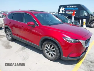 2018 Mazda CX-9 Touring with VIN JM3TCBCY6J0201556, listed as a IAAI auction lot 42285456 with 144,841 mi miles and . Bid and sale history available at DreamBid. Image 1.