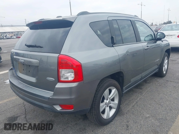 2011 Jeep Compass with VIN 1J4NF1FB7BD244088, listed as a IAAI auction lot 41889165 with 93,576 mi miles. Bid and sale history available at carsss.com. Image 4.