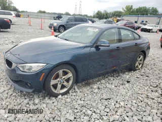 2015 BMW 4 Series 428i xDrive with VIN WBA4C9C57FD330687, listed as a Copart auction lot 67639034 with 114,779 mi miles and Salvage title. Bid and sale history available at DreamBid. Image 1.