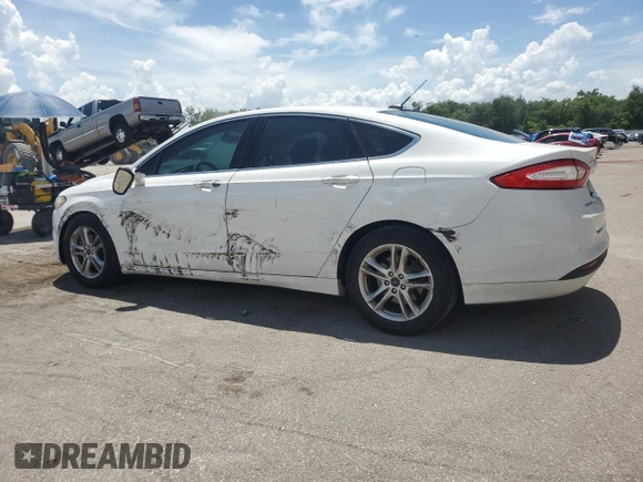 2015 Ford Fusion SE with VIN 3FA6P0HD0FR210965, listed as a Copart auction lot 62905465 with 183,469 mi miles and Salvage title. Bid and sale history available at DreamBid. Image 2.