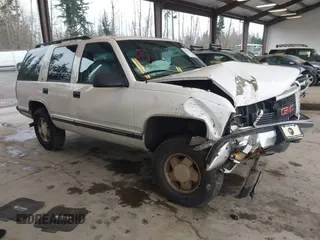 1998 GMC Yukon with VIN 1GKEK13R7WJ700881, listed as a IAAI auction lot 41507538 with 188,396 mi miles. Bid and sale history available at carsss.com. Image 1.