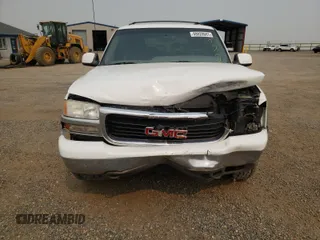 2001 GMC Yukon SLT z VIN 1GKEK13T61J150626, wystawiony jako Copart lot #49920601 z przebiegiem 224 707 mil mil oraz Czysty tytuł • Clean title. Historia ofert i sprzedaży dostępna na DreamBid. Obrazek 9.