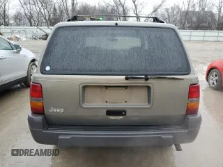 1996 Jeep Grand Cherokee Laredo with VIN 1J4GZ58S9TC172760, listed as a Copart auction lot 86086644 with 220,037 mi miles and Clean Title. Bid and sale history available at carsss.com. Image 6.