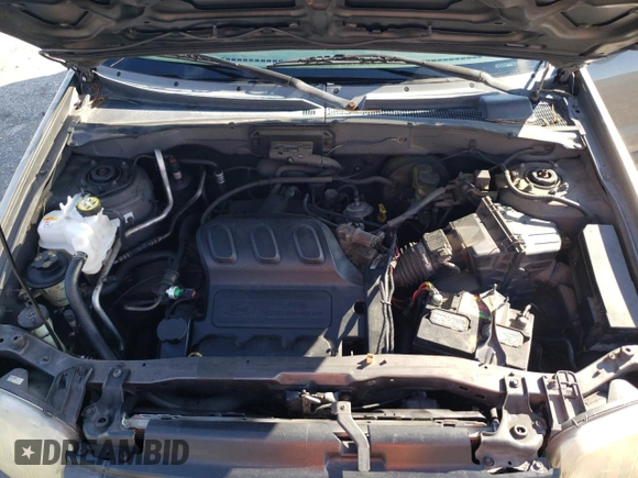 2004 Ford Escape XLS with VIN 1FMYU92134KA21707, listed as a Copart auction lot 72114804 with 219,518 mi miles and Salvage Title. Bid and sale history available at DreamBid. Image 12.