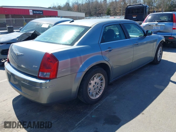 2006 Chrysler 300 with VIN 2C3KA43R06H218634, listed as a IAAI auction lot 41821366 with 150,313 mi miles. Bid and sale history available at carsss.com. Image 4.