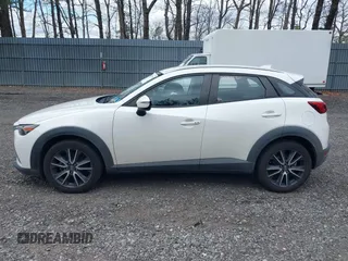 2018 Mazda CX-3 Touring with VIN JM1DKFC71J0315074, listed as a IAAI auction lot 42029790 with 100,268 mi miles. Bid and sale history available at carsss.com. Image 14.