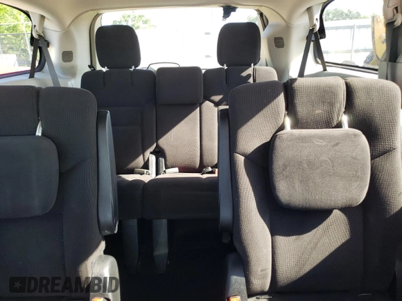 2014 Dodge Grand Caravan SXT z VIN 2C4RDGCG6ER427418, wystawiony jako Copart lot #58804395 z przebiegiem 154 524 mil mil oraz Tytuł czysty. Historia ofert i sprzedaży dostępna na DreamBid. Obrazek 10.