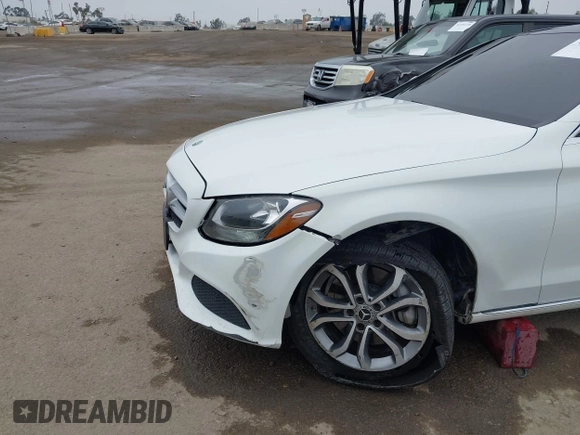 2018 Mercedes-Benz C 300 with VIN 55SWF4JB5JU253705, listed as a IAAI auction lot 42158469 with 93,676 mi miles and . Bid and sale history available at carsss.com. Image 6.