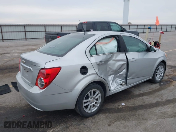 2012 Chevrolet Sonic LT with VIN 1G1JC5SH0C4162034, listed as a IAAI auction lot 41967195 with 87,086 mi miles and . Bid and sale history available at DreamBid. Image 4.