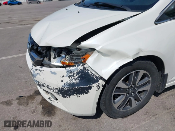 2016 Honda Odyssey Touring Elite with VIN 5FNRL5H97GB044278, listed as a IAAI auction lot 42056101 with 182,396 mi miles and . Bid and sale history available at DreamBid. Image 6.