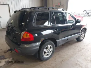 2004 Hyundai Santa Fe GLS with VIN KM8SC73D34U659949, listed as a IAAI auction lot 42111322 with 205,309 mi miles. Bid and sale history available at carsss.com. Image 4.