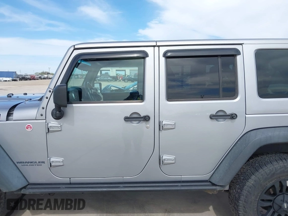 2015 Jeep Wrangler Unlimited Rubicon Hard Rock с VIN 1C4HJWFG6FL762537, выставлен на аукционе IAAI как лот 41792066 с пробегом 125 829 миль миль и . История ставок и продаж доступна на DreamBid. Изображение 14.