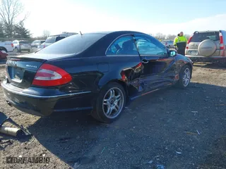 2004 Mercedes-Benz CLK-Class AMG with VIN WDBTJ76H24F113952, listed as a IAAI auction lot 41690890 with 109,766 mi miles. Bid and sale history available at carsss.com. Image 4.