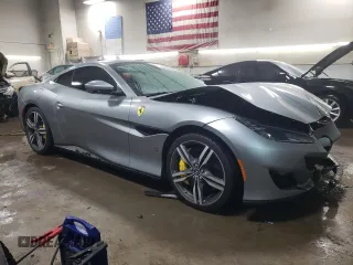 2019 Ferrari Portofino z VIN ZFF89FPA8K0242811, wystawiony jako Copart lot #45493295 z przebiegiem 12 470 mil mil oraz Szkody całkowita. Historia ofert i sprzedaży dostępna na DreamBid. Obrazek 4.