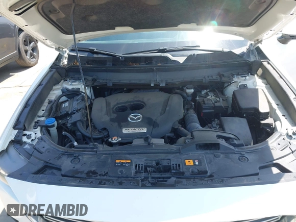2019 Mazda CX-9 Touring z VIN JM3TCBCY2K0300702, wystawiony jako IAAI lot #42194050 z przebiegiem 98 247 mil mil oraz . Historia ofert i sprzedaży dostępna na DreamBid. Obrazek 10.