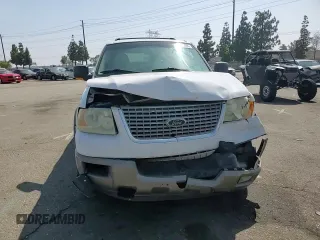 2003 Ford Expedition Eddie Bauer z VIN 1FMFU17L83LA96334, wystawiony jako Copart lot #58755595 z przebiegiem 200 554 mil mil oraz Szkoda całkowita • Salvage title. Historia ofert i sprzedaży dostępna na DreamBid. Obrazek 14.