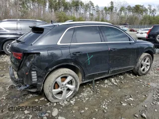 2020 Audi Q3 Premium with VIN WA1AECF30L1025756, listed as a Copart auction lot 50295125 with 77,389 mi miles and Salvage title. Bid and sale history available at DreamBid. Image 3.