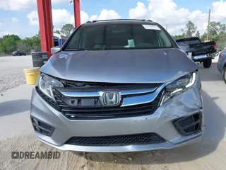 2020 Honda Odyssey EX-L with VIN 5FNRL6H72LB055672, listed as a IAAI auction lot 41586663 with 47,037 mi miles and . Bid and sale history available at carsss.com. Image 6.