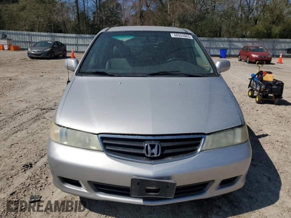 2004 Honda Odyssey EX-L with VIN 5FNRL18974B074613, listed as a Copart auction lot 48924865 with 212,633 mi miles and Salvage Title. Bid and sale history available at DreamBid. Image 5.