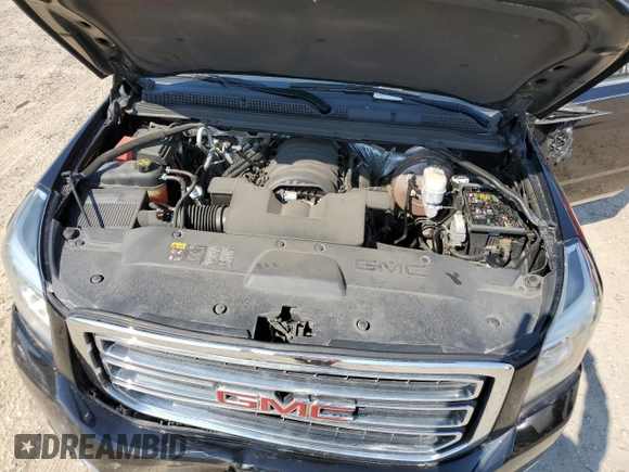 2015 GMC Yukon SLE with VIN 1GKS1AKC0FR228818, listed as a Copart auction lot 48677585 with 175,950 mi miles and Clean Title. Bid and sale history available at carsss.com. Image 12.
