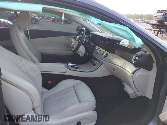2018 Mercedes-Benz E 400 with VIN WDD1J6FB1JF021229, listed as a IAAI auction lot 42197884 with 72,011 mi miles and . Bid and sale history available at DreamBid. Image 5.