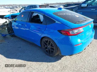 2024 Honda Civic Sport Touring z VIN 19XFL1G80RE001317, wystawiony jako IAAI lot #41246635 z przebiegiem 20 422 mil mil oraz . Historia ofert i sprzedaży dostępna na DreamBid. Obrazek 3.