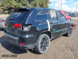2018 Jeep Grand Cherokee Laredo E with VIN 1C4RJFAG8JC453706, listed as a IAAI auction lot 41688655 with 116,965 mi miles. Bid and sale history available at carsss.com. Image 4.