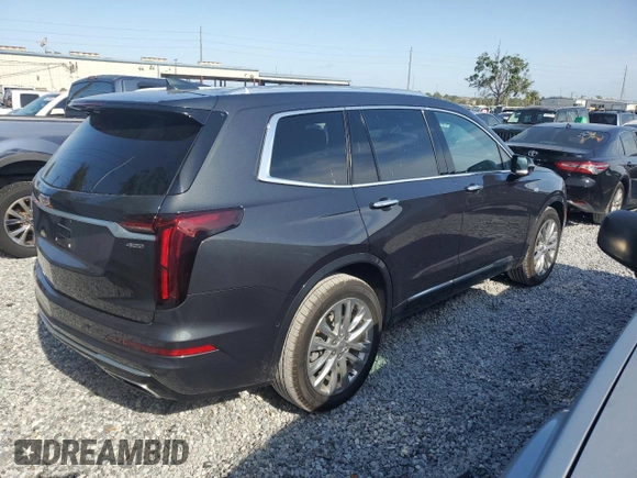 2021 Cadillac XT6 Premium Luxury with VIN 1GYKPCRS1MZ199288, listed as a Copart auction lot 54264995 with 51,432 mi miles and Salvage Title. Bid and sale history available at carsss.com. Image 3.