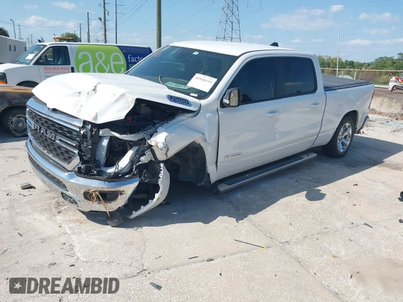2022 Ram 1500 Big Horn z VIN 1C6RRFMG2NN430198, wystawiony jako IAAI lot #41944132 z przebiegiem 54 479 mil mil oraz . Historia ofert i sprzedaży dostępna na DreamBid. Obrazek 23.