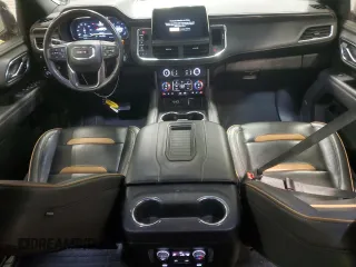 2023 GMC Yukon AT4 with VIN 1GKS2CKDXPR164502, listed as a Copart auction lot 41672705 with 34,856 mi miles and Salvage Title. Bid and sale history available at carsss.com. Image 8.
