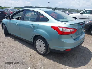 2012 Ford Focus SE with VIN 1FAHP3F2XCL240934, listed as a IAAI auction lot 42673102 with 188,658 mi miles and . Bid and sale history available at DreamBid. Image 3.