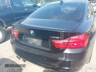 2014 BMW 4 Series 428i xDrive with VIN WBA3N5C52EF716998, listed as a IAAI auction lot 42548467 with 212,418 mi miles and . Bid and sale history available at DreamBid. Image 16.