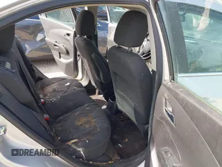 2015 Chevrolet Sonic LT with VIN 1G1JC5SH6F4121976, listed as a IAAI auction lot 42143052 with 63,885 mi miles and . Bid and sale history available at DreamBid. Image 8.
