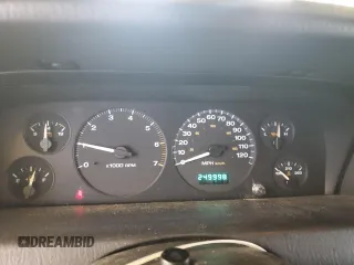 2003 Jeep Grand Cherokee Laredo with VIN 1J4GW48S43C567559, listed as a Copart auction lot 61431595 with 249,998 mi miles and Salvage title. Bid and sale history available at DreamBid. Image 9.