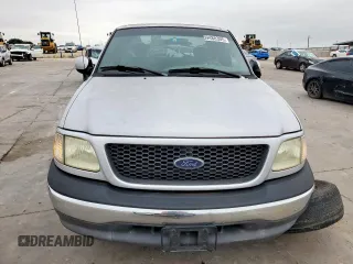 2002 Ford F-150 XL z VIN 1FTRX07W72KB81327, wystawiony jako Copart lot #59488305 z przebiegiem 102 848 mil mil oraz Szkoda całkowita • Salvage title. Historia ofert i sprzedaży dostępna na DreamBid. Obrazek 5.