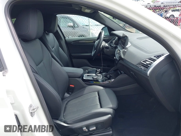 2023 BMW X4 M40i with VIN 5UX43DT03P9P97845, listed as a IAAI auction lot 42098144 with 20,807 mi miles and . Bid and sale history available at DreamBid. Image 5.