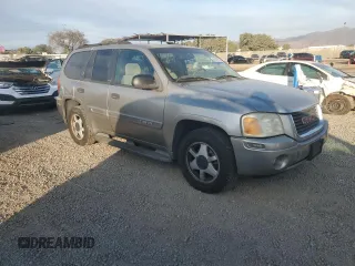 2002 GMC Envoy SLT with VIN 1GKDS13S922287249, listed as a Copart auction lot 88049875 with 157,485 mi miles and Salvage Title. Bid and sale history available at carsss.com. Image 4.