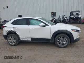 2021 Mazda CX-30 Premium with VIN 3MVDMBDM8MM216520, listed as a IAAI auction lot 41848596 with 60,353 mi miles and . Bid and sale history available at DreamBid. Image 13.