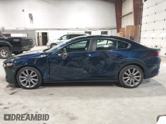 2021 Mazda 3 Select with VIN 3MZBPBBL3MM251893, listed as a IAAI auction lot 41854476 with 56,661 mi miles and . Bid and sale history available at DreamBid. Image 14.