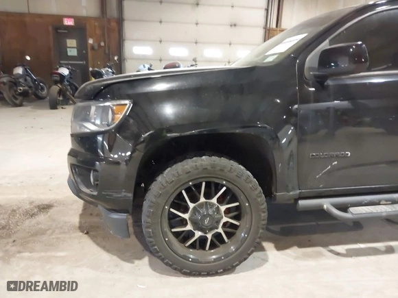 2018 Chevrolet Colorado 4WD Work Truck with VIN 1GCGTBENXJ1268300, listed as a IAAI auction lot 41276225 with 76,555 mi miles. Bid and sale history available at carsss.com. Image 18.